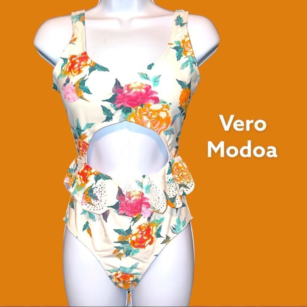 Vero Moda white one piece with floral design!